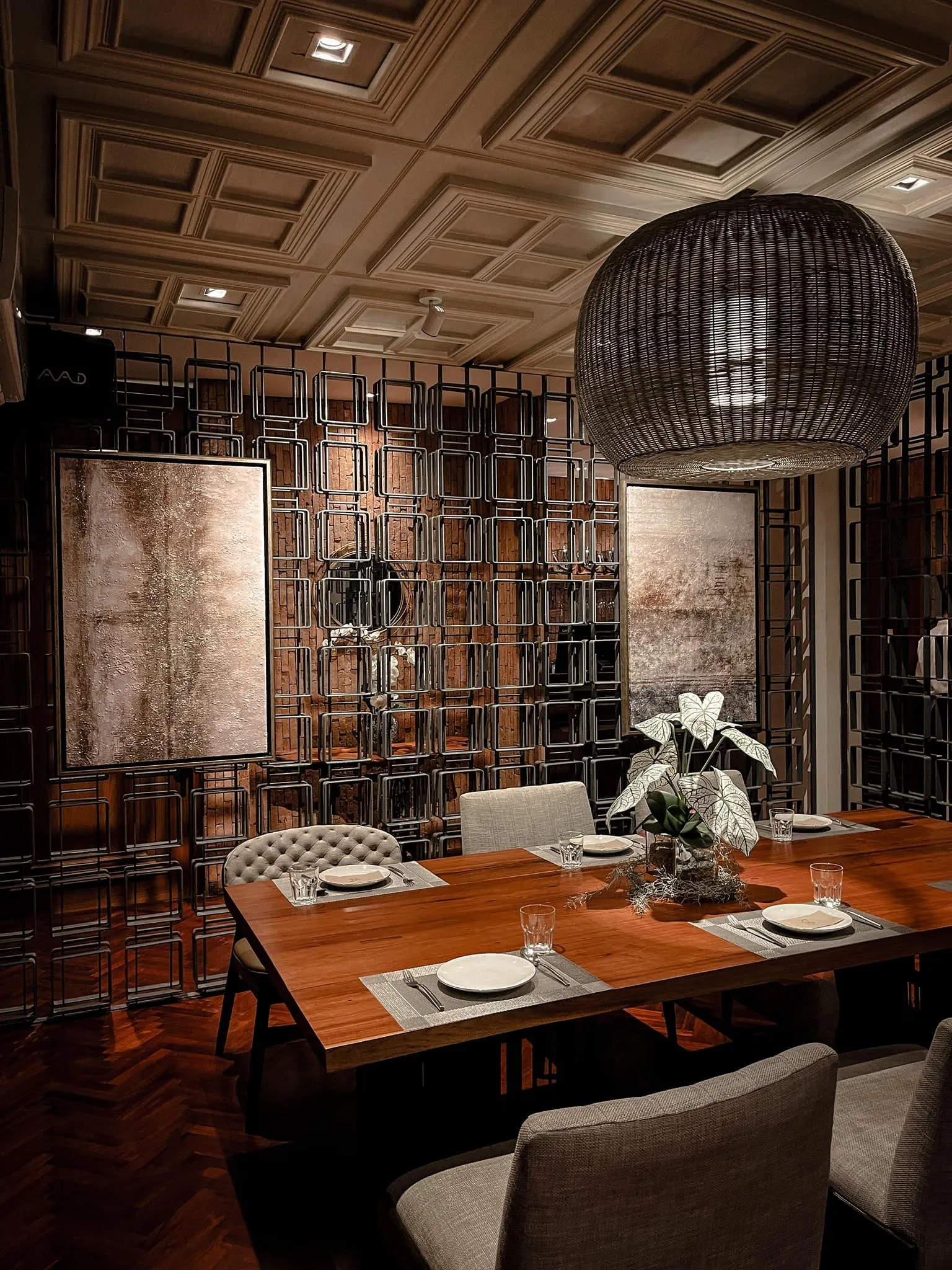 Private room with woven wooden lamps